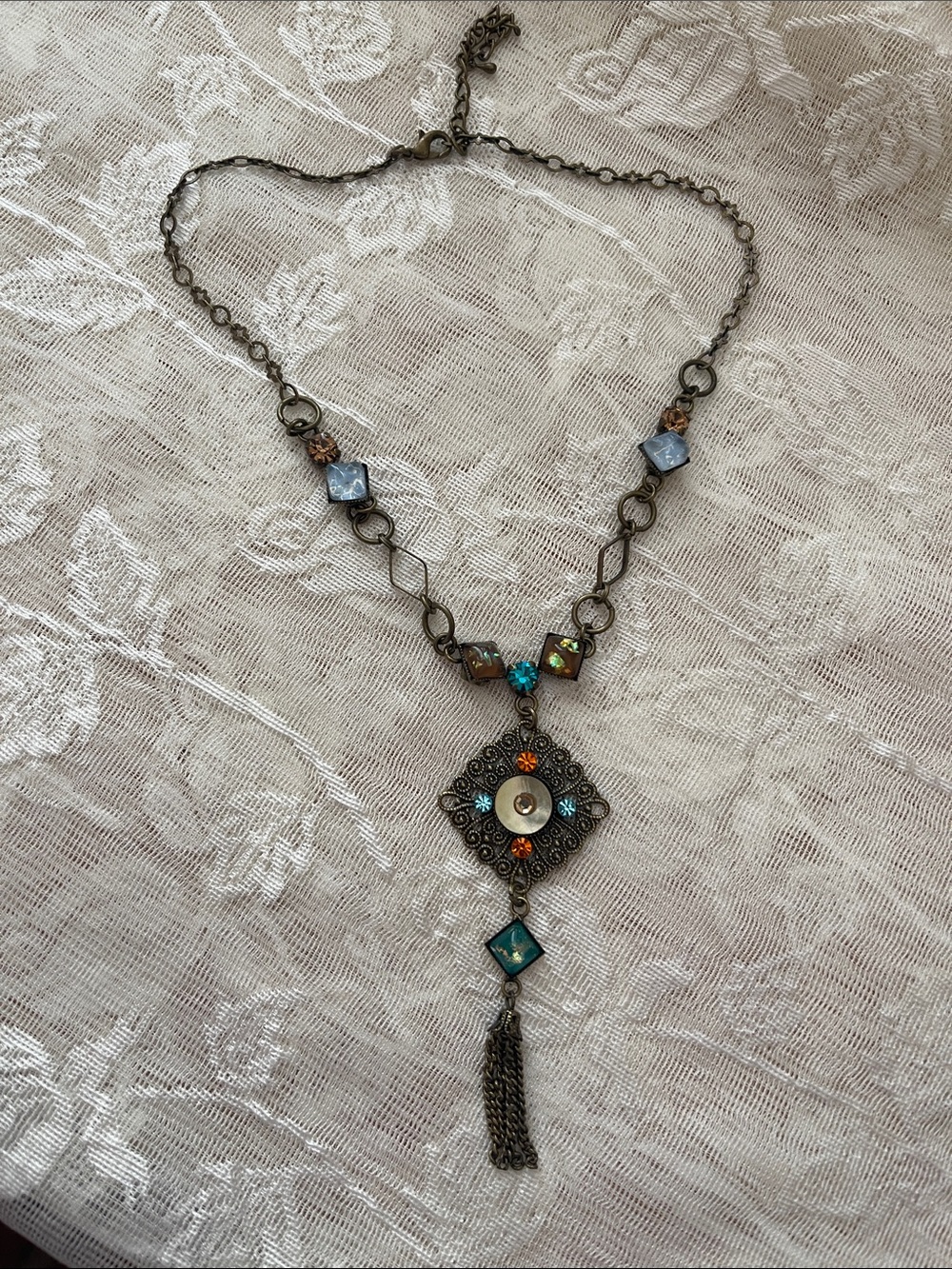 Antique Bronze Filigree Pendant Necklace with Turquoise and Orange Accents